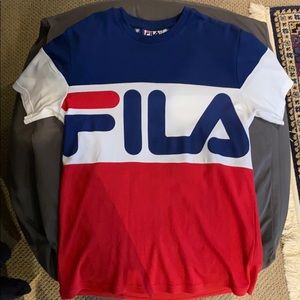 Red, white and blue Fila shirt.